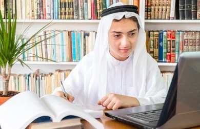 arabic muslim student studying online for SAAT exam